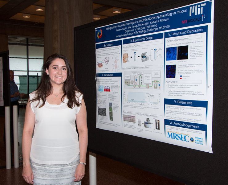 Heather Giblin, a biology teacher at Brookline High School, presents her poster on work in the lab of Katharina Ribbeck, associate professor of biological engineering. Giblin investigated the effects of mucin polymers on biofilm formation in the opportunistic fungal pathogen.