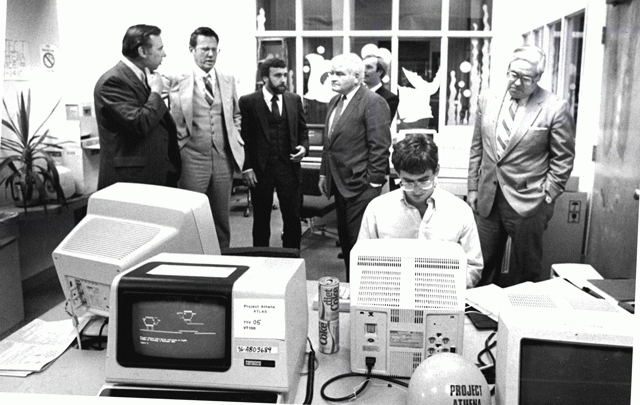 Leaders from MIT and General Electric gather in 1984, when the GE Foundation donated a $1 million five-year grant to support Project Athena, a campus-wide educational computing project that brought computers to students across the Institute. 