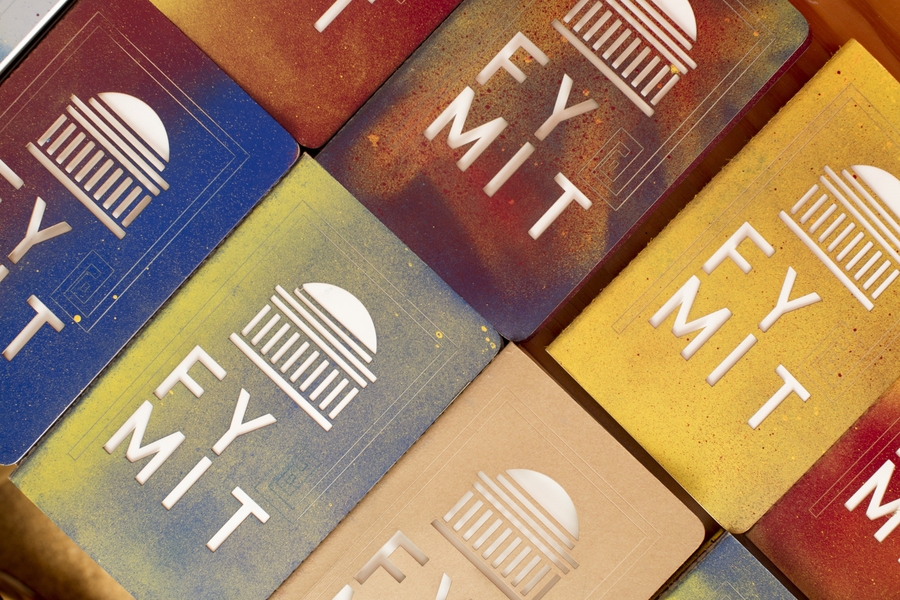 Custom die-cut and spray-painted notebooks were created by a teaching assistant in the spring 2018 Designing the First-Year Experience course.