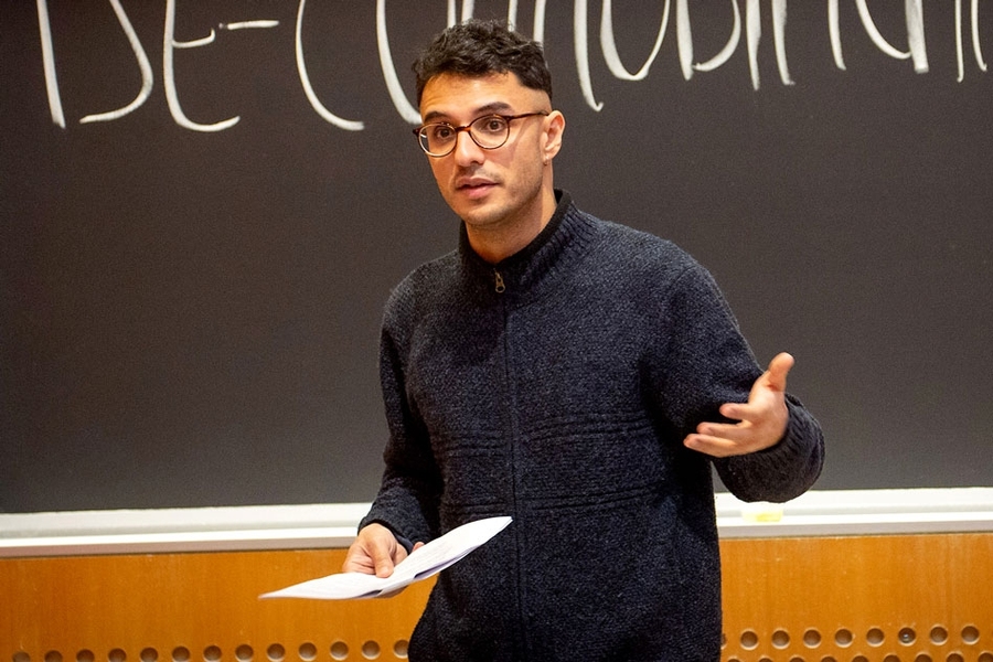 “This class has increased my ability to consider questions of right and wrong in political or legal matters,” says sophomore Ahmed Elbashir. “What surprised me the most is how our current institutions in the United States — and in most systems of government throughout the world — do not conform particularly well to any theory of justice." Seen here: Instructor Bernardo Zacka, assistant p...