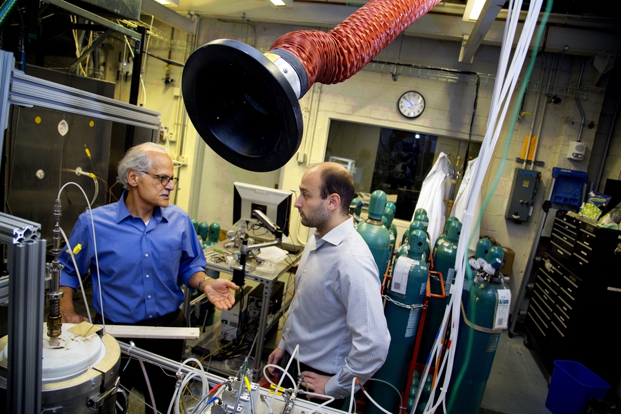 Professor Ahmed Ghoniem (left) meets with postdoc Georgios Dimitrakopoulos in the Center of Energy and Propulsion Research/Reacting Gas Dynamics Laboratory.

