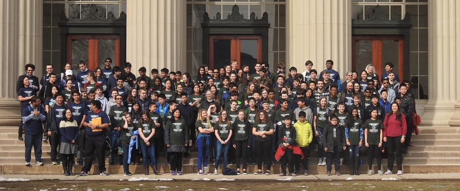 Participants, organizers, and volunteers at the 2019 Northeast Regional Middle School Science Bowl gather in MIT's iconic Killian Court for a group photo. 
