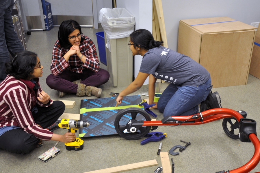 ATHack participants Ananya Nandy, Vyshnavi Vennelakanti, and Kanika Gakhar (l-r) collaborate on their technology.