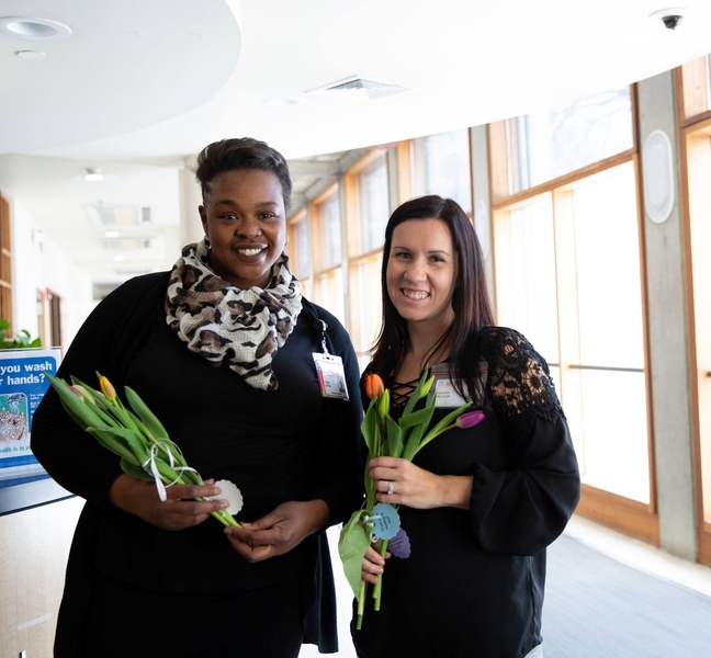 MIT Medical staff handed out daffodils to visiting patients.