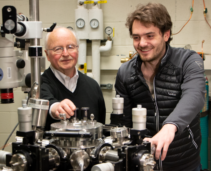 MIT Professor Harry Tuller and third-year graduate student Thomas Defferriere use a high-temperature micro-probe station to make both electrical and optical measurements of materials for fuel cell electrodes, memory devices, and other electroceramic materials. 