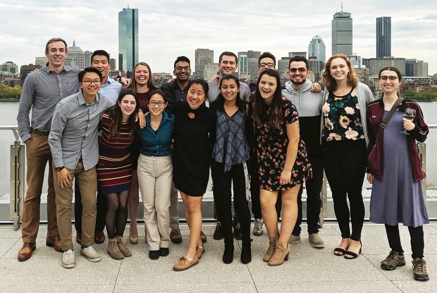 The Department of Civil and Environmental Engineering Class of 2019 gathered at MIT's Samberg Conference Center for a photo with the Boston skyline as the backdrop.