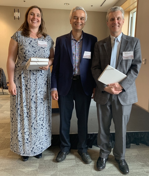 Dean of Digital Learning Krishna Rajagopal (center) stands with winners of the MITx Prize for Teaching and Learning in MOOCs, Jessica Sandland (left) and Martin Bazant. Not pictured: Polina Anikeeva, who also received the MITx Prize, and John Belcher, Amy Carleton, Jared Curhan, and Erik Demaine, who received Teaching with Digital Technology Awards.
