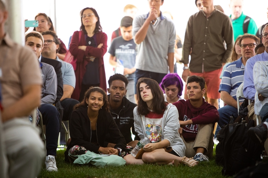 Members of the incoming Class of 2023 and their families listen to remarks by President Reif and three professors who are also MIT alumni.