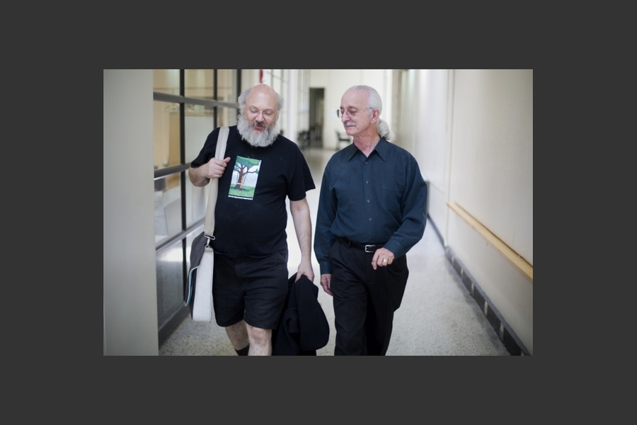 Flowers speaks with former student, Professor David Wallace.