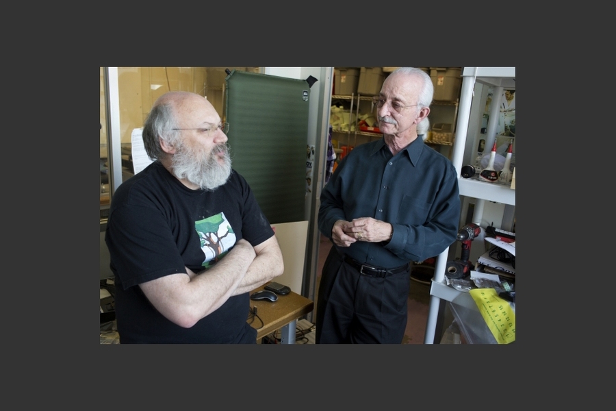 Flowers speaks with former student, Professor David Wallace.