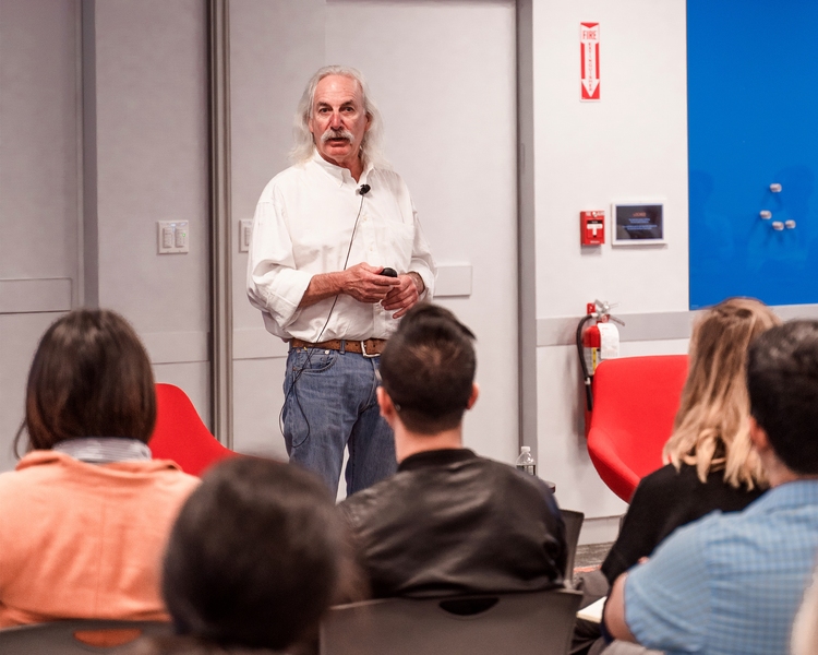 Don Eigler, Kavli Laureate and former fellow of the IBM Almaden Research Center, makes introductory remarks before sitting for an informal "fireside chat" with MIT students, faculty, and others.