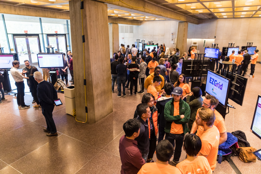 Teams of EnergyHack participants in Lobby 13 present their solutions to judges and peers. 