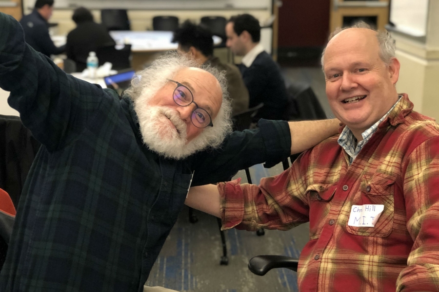 The Green AI Hackathon was organized by IBM's John Cohn (left) and MIT's Christopher Hill.