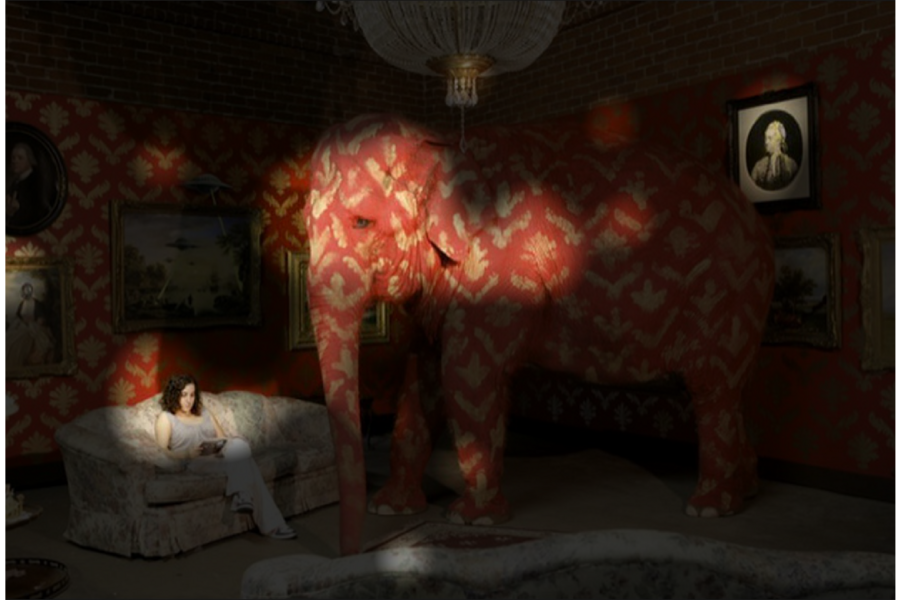 Given 5 seconds to view the same image, viewers turned their attention to the paintings on the wall and the woman seated on the couch, as shown in this heat map. Researchers used this experimental data to build an AI model that successfully predicted the distinct shifts in human attention that they observed in their study at various durations.