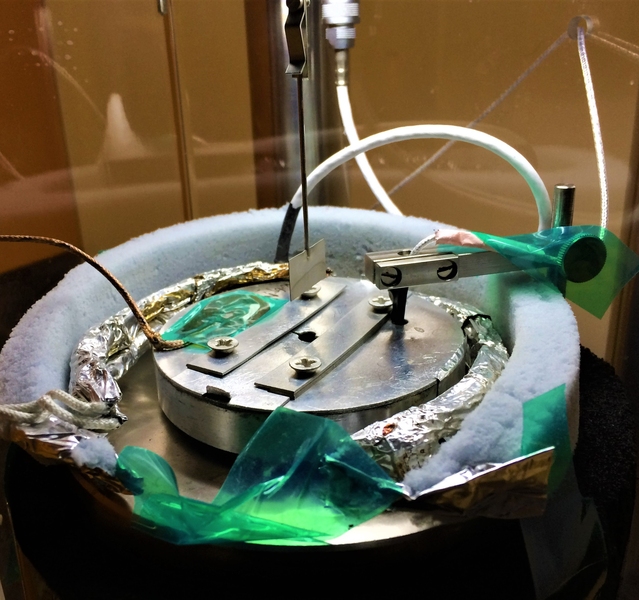 Close-up of experimental setup for testing the surface tension of seawater