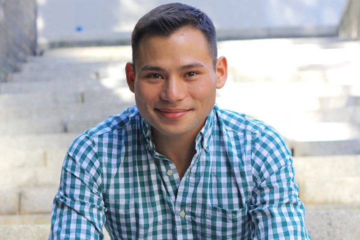 A photo portrait of Erik Lin-Greenberg