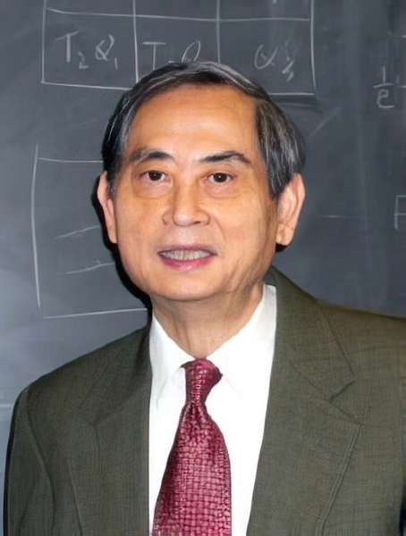 Portrait photo of Professor Emeritus Sow-Hsin Chen, dressed in a suit and tie and standing in front of a blackboard.