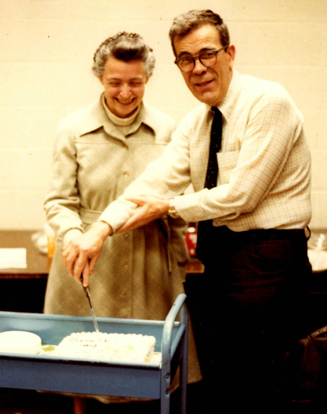 Gene Dresselhaus (right) cuts a birthday cake with Mildred Dresselhaus