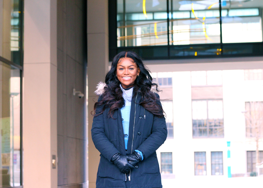 Photo of Rachel Myers outdoors in a winter jacket and gloves