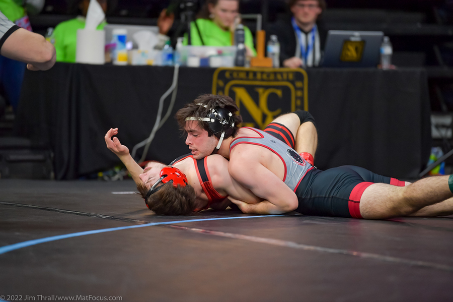 Photo of MIT's Keith Skaggs pinning an opponent at the NCWA Championship.