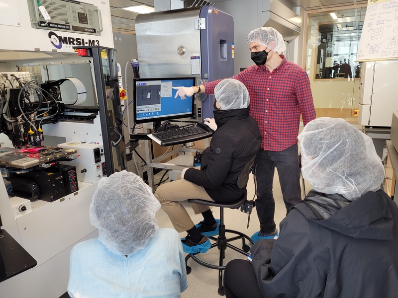 Photo of graduate student Drew Michael Weninger instructing bootcamp participants at MIT LEAP