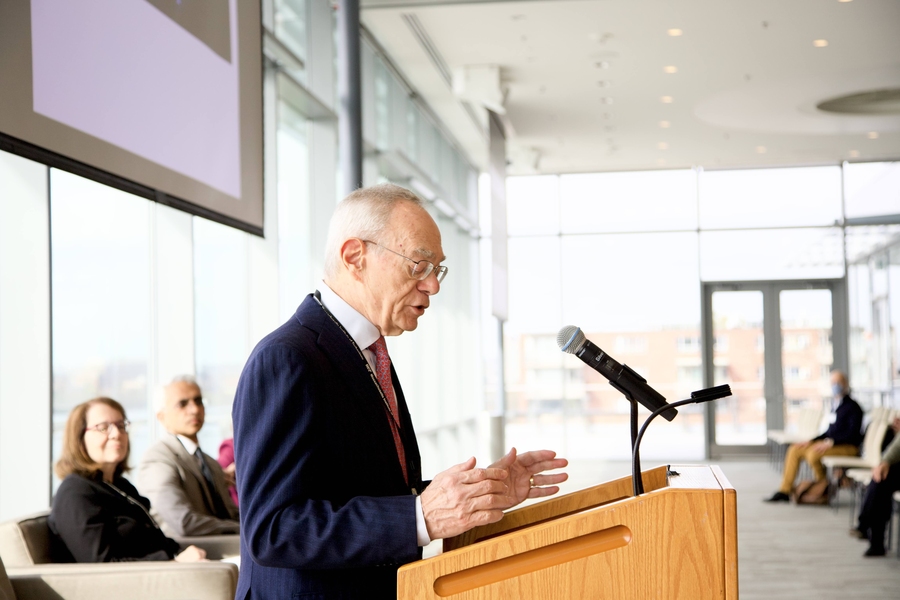 Photo of L. Rafael Reif at a podium, speaking and gesturing 