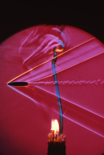 A bullet traveling through the hot air of a candle at twice the speed of sound leaves a visible wake