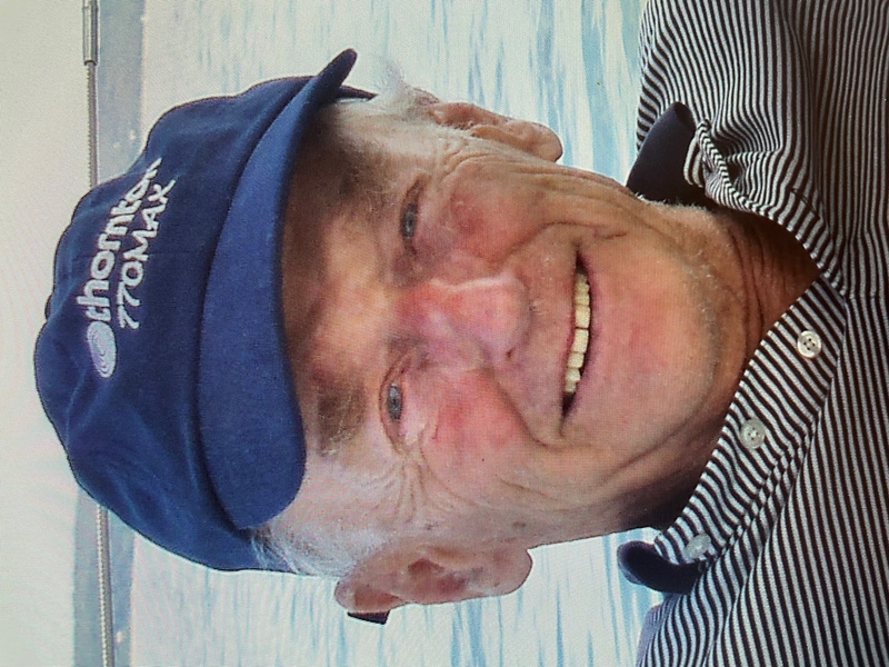 Headshot of Richard Thornton late in his life with a lake in the background