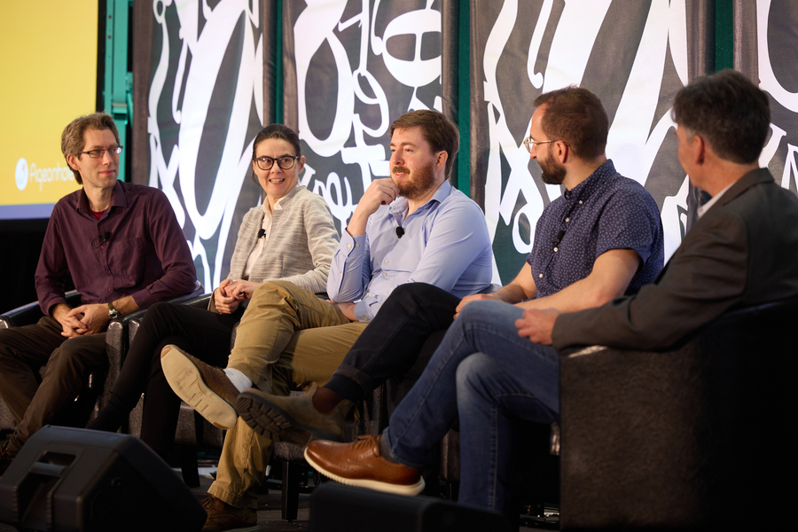 Five MIT faculty and researchers participate seated in a panel discussion 
