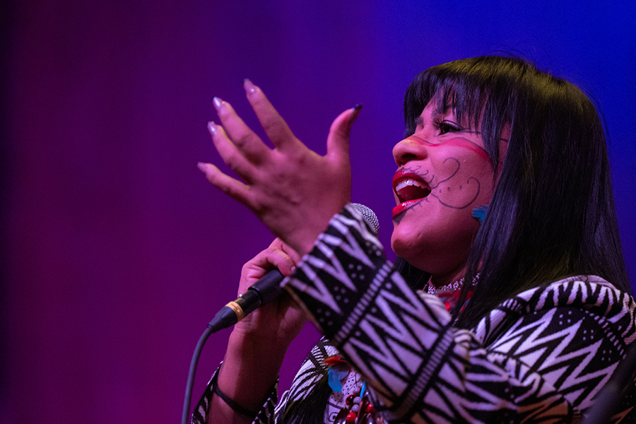 Performer Djuena Tikuna sings. 