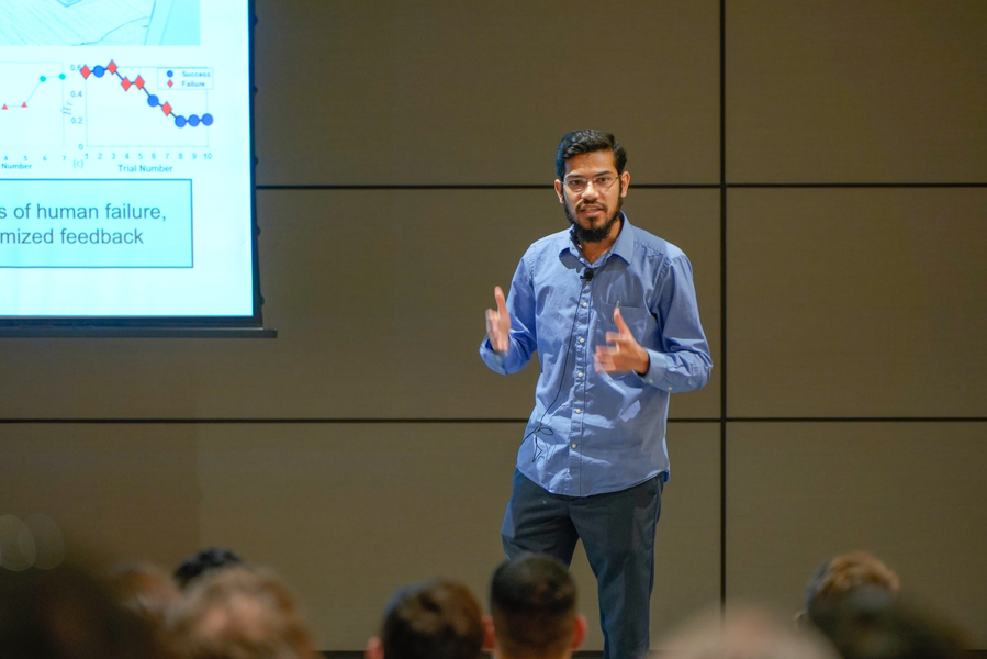 Mohammed Aatif Shahab addresses the Research Slam audience. 