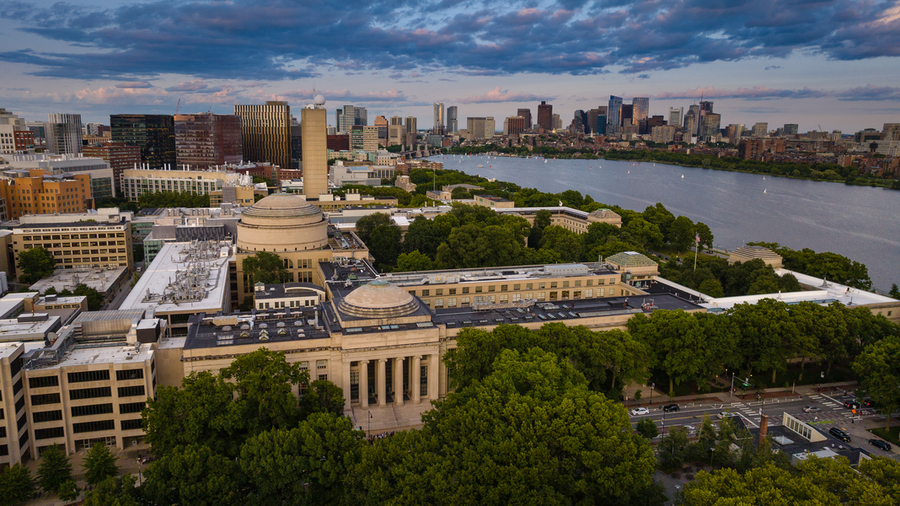 Aerial view of the MIT campus, with the Charles River and Boston in the background