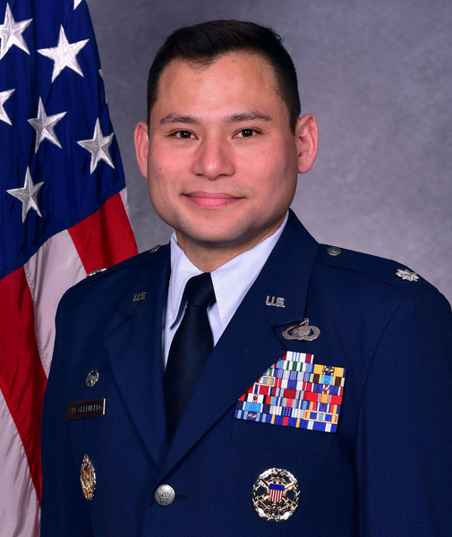 Erik Lin-Greenberg military portrait photo with U.S. flag 