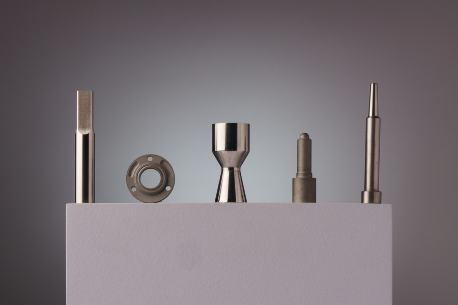 Five metal tools like a screwdriver head
