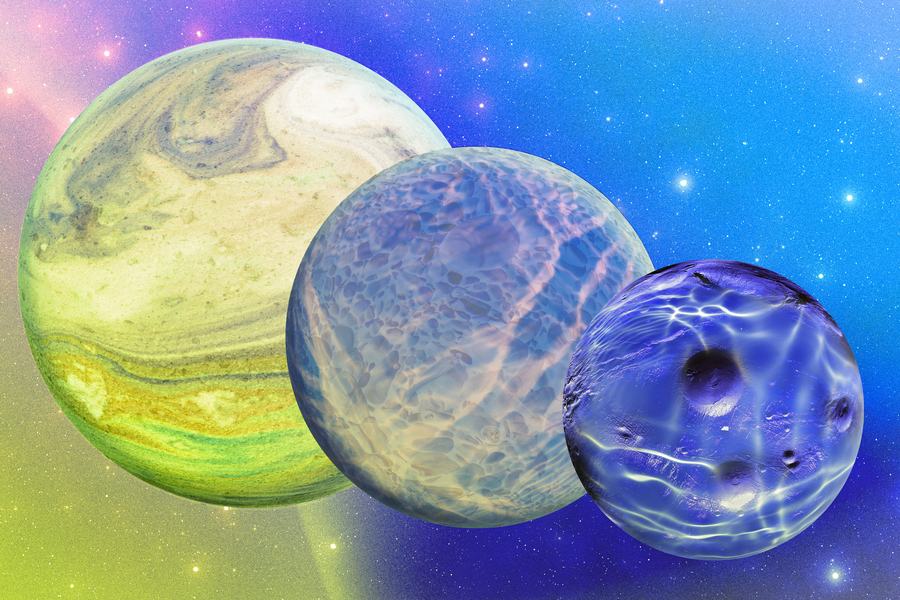 Three colorful watery planets in space