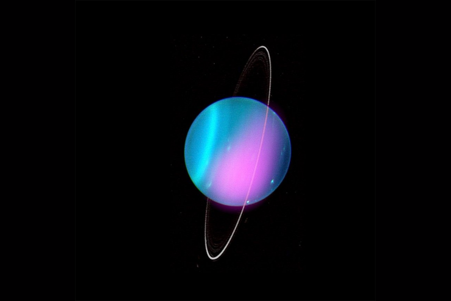 Uranus depicted in blues and pinks, encircled by a near vertical white ring.