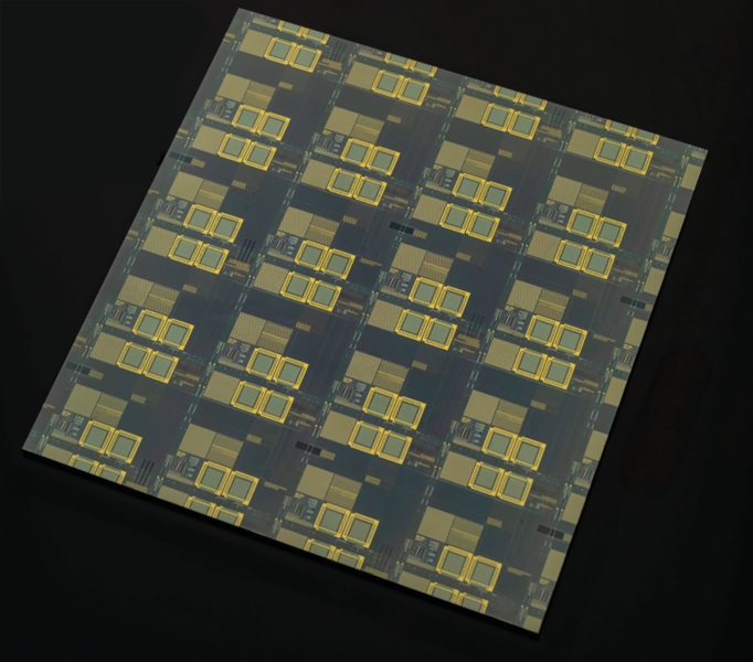 An image of integrated circuits on a square of semiconductor material. 