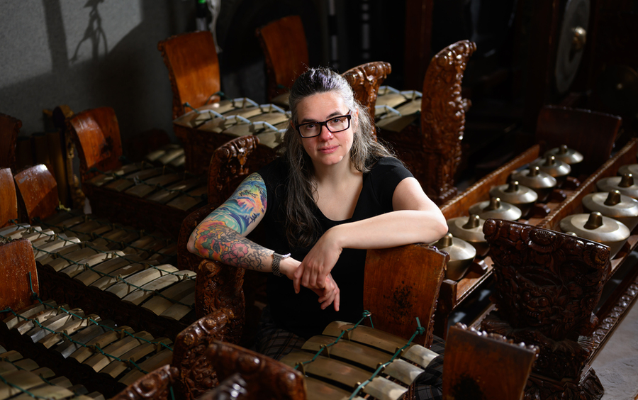 Leslie Tilley surrounded by musical instruments