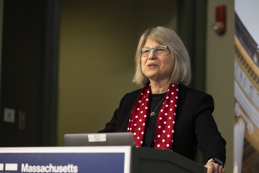 Sally Kornbluth speaks at a podium