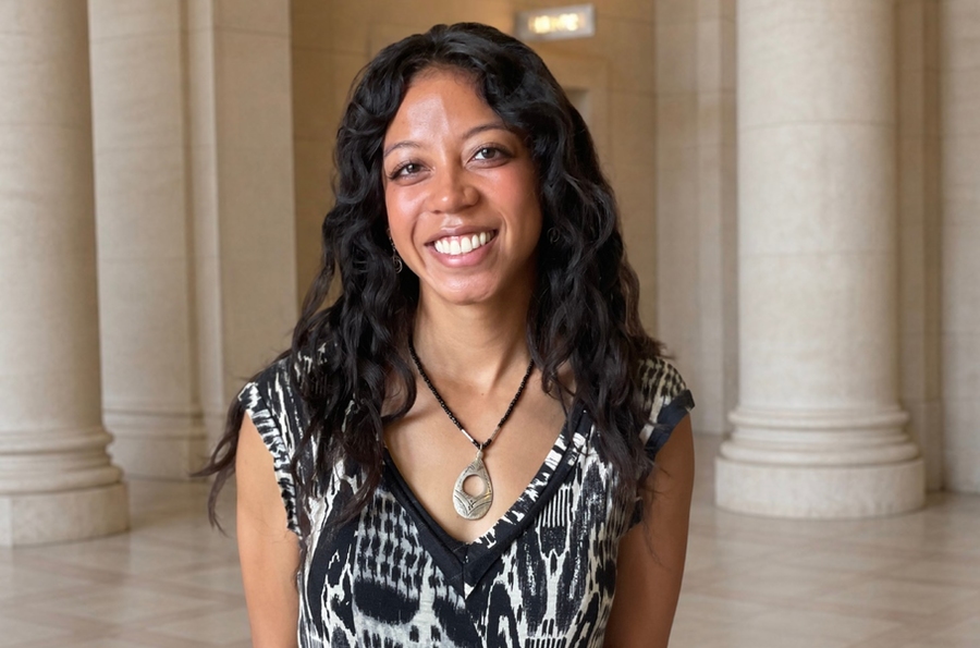 Portrait photo of Krystal Montgomery in front of some columns