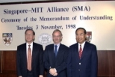 Professor Lim Pin, vice chancellor of the National University of Singapore (left), MIT Provost Robert A. Brown (center) and Nanyang Technological University's president, Dr. Cham Tao Soon, at yesterday's ceremony formalizing the collaboration between the three schools.