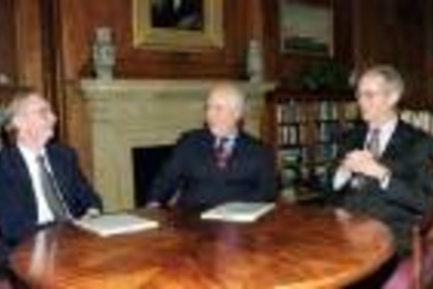 MIT Provost Robert A. Brown (left), Nanovation President and CEO G. Robert Tatum (center) and MIT President Charles M. Vest discuss plans after signing the MIT-Nanovation photonics research agreement in President Vest's office.