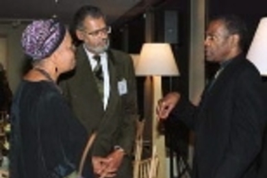 Professor Emeritus Willard R. Johnson of political science (center) and Mrs. Johnson listen intently to Gus Solomons, winner of the Muh Award, during the SHASS gala at the Museum of Fine Arts last weekend.