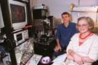 Biology professor Martha Constantine-Paton (right), graduate student Matthew Townsend and others have identified a molecule that may help the brain to learn. On the computer screen, they show evidence that direct input from the retina was received by neurons in the brain.