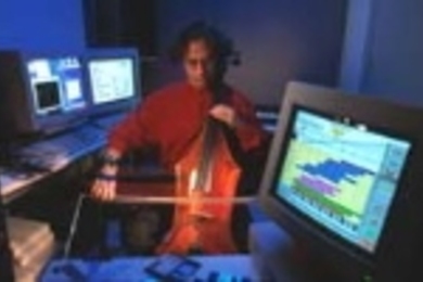 Professor Tod Machover, whose compositions will be performed as part of the Cyberarts Festival, tests his hypercello.