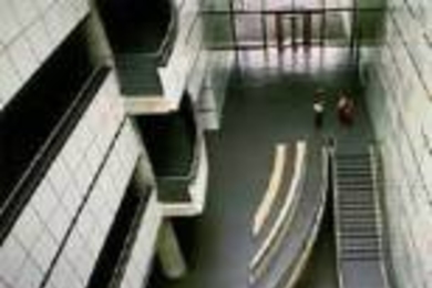 Lobby, Wiesner BuildingArchitect: I.M. PeiBalustrades and seating: Scott BurtonSteel and concrete, 1985Wall mural: Kenneth NolandHere-There, 1985Colored painted inserts in wall