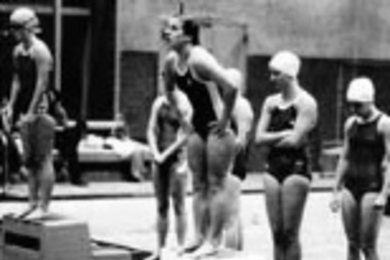 Karen Klincewicz (now Karen Gleason), center, stands ready to go in this photo of a swim meet taken from the 1980 Technique. She always wore her hair in a vertical ponytail like this when she swam. "It was funny. You know how your hair sticks together when you swim," she said.