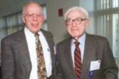 John Gibbons (left), who served President Clinton as assistant to the president for science and technology and director of the Office of Science and Technology Policy, talked with William T. Golden at the MIT celebration of the 25th anniversary of OSTP. Golden, now 91, was advising President Truman in 1950 and urged the appointment of a scientific advisor to the President.