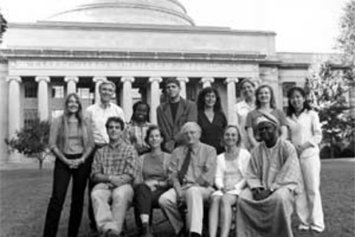 The Knight Fellows for 2001-02 pose together for a class portrait. Front row (left to right): Sean McNaughton, program coordinator Martha Henry, director Boyce Rensberger, Agnieszka Biskup and Diran Onifade. Back row (left to right): Rebecca Perry, David Chanatry, Ibiba Don Pedro, administrative assistant John Nikolai, Carey Goldberg, Barbara Moran, Carol Hills and SeHee Hwang.