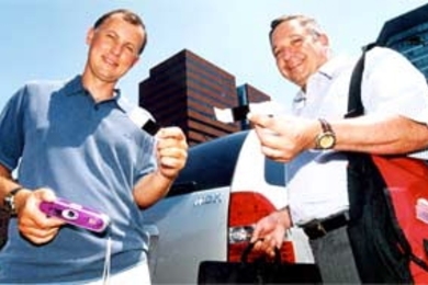 Sloan Professors Duncan Simester and Ely Dahan with some of the products their research team has tested as part of the Virtual Customer Initiative.